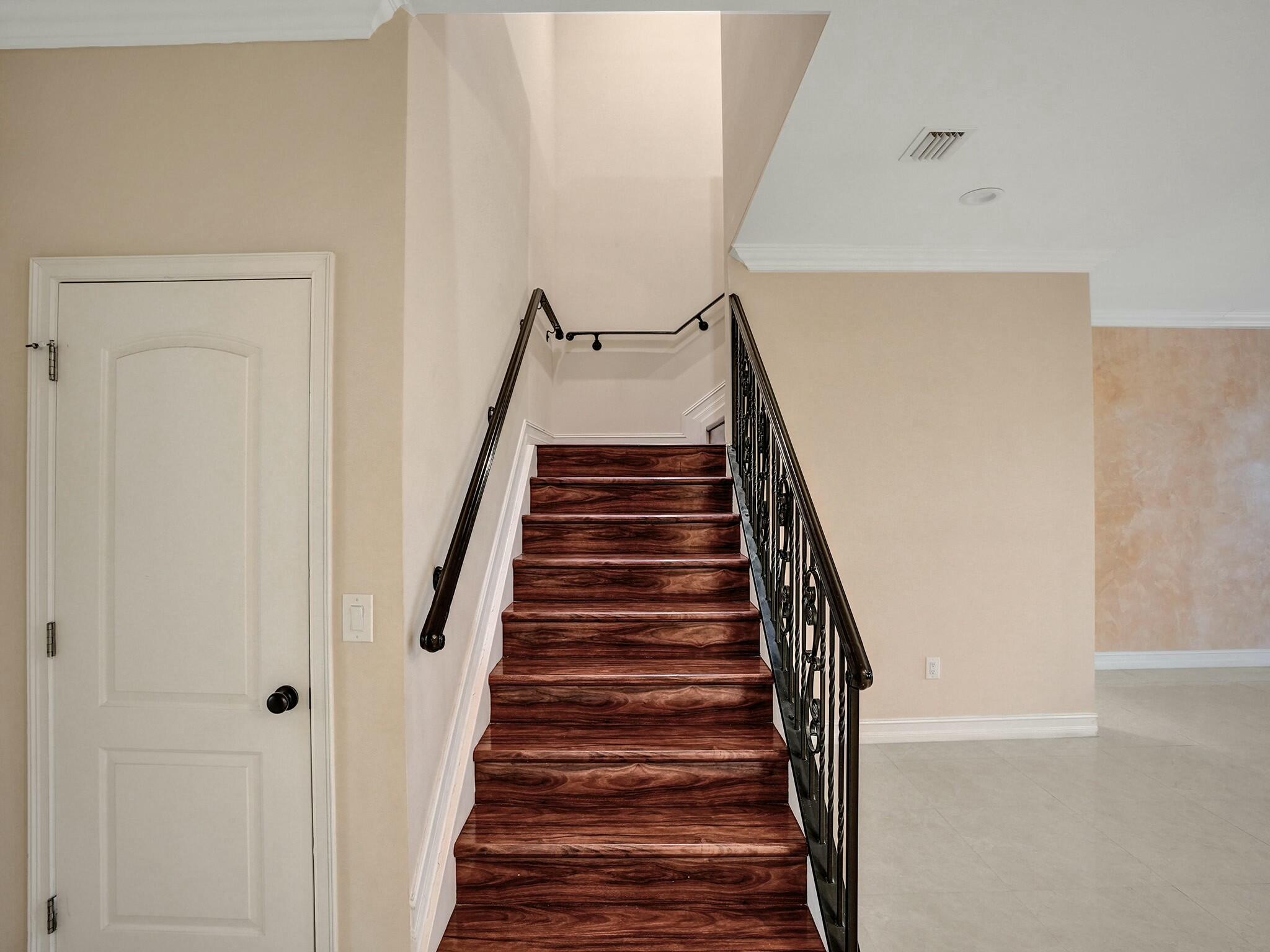 3243 Northeast 5th Street Pompano Beach, FL 33062 - Photo 11 of 43 Stairs to upper level