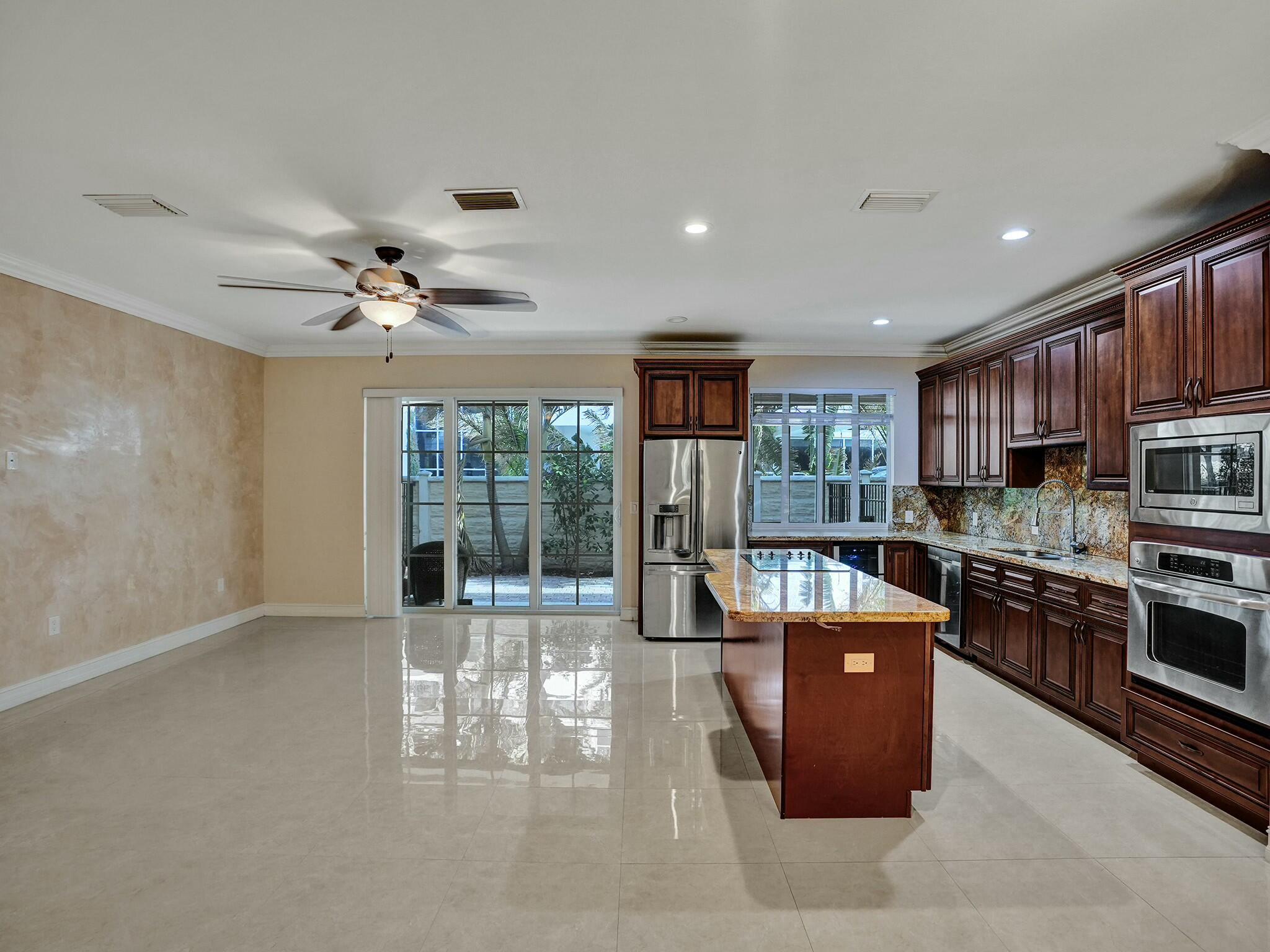 3243 Northeast 5th Street Pompano Beach, FL 33062 - Photo 6 of 43 Kitchen and family room