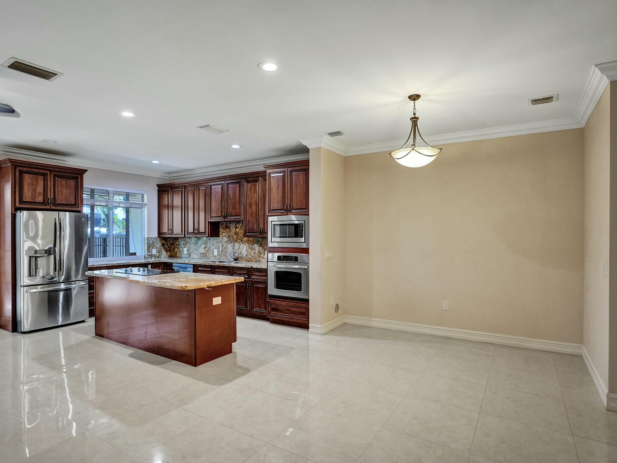 3243 Northeast 5th Street Pompano Beach, FL 33062 - Photo 8 of 43 Kitchen and dining area