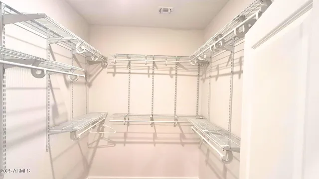 a view of a room with a large window