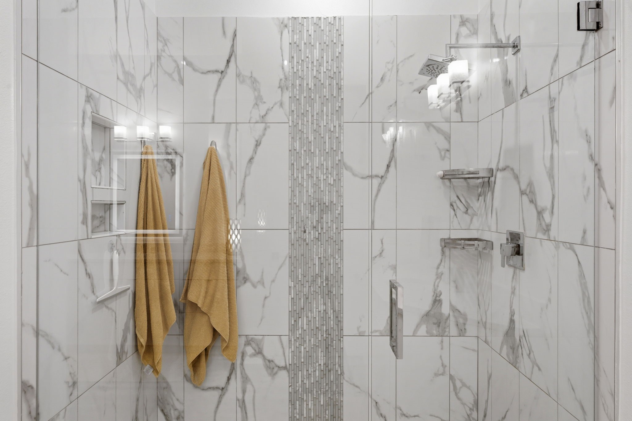 199 Waterpoint Court, Unit 202 Conroe, TX 77304 - Photo 22 of 41 a bathroom with a shower