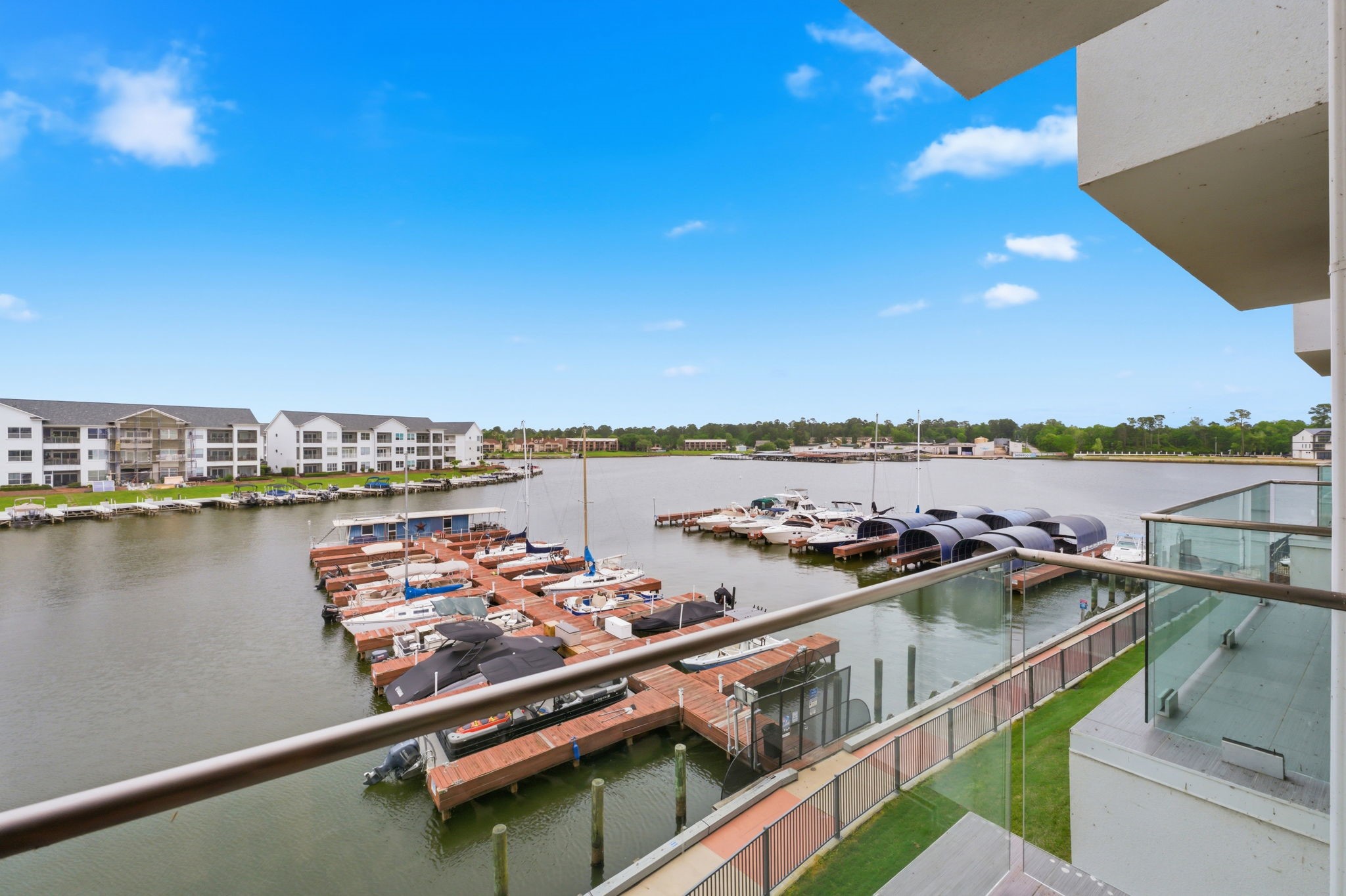 199 Waterpoint Court, Unit 202 Conroe, TX 77304 - Photo 25 of 41 a view of a ocean with city view