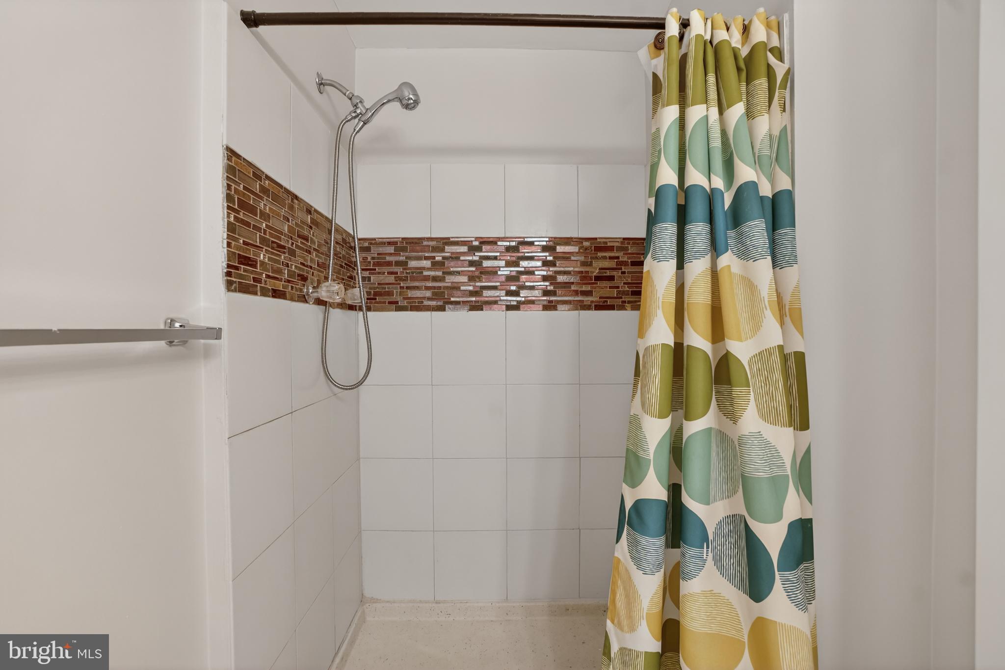 1232 Palmer Road, Unit 111 Fort Washington, MD 20744 - Photo 35 of 45 a bathroom with a shower
