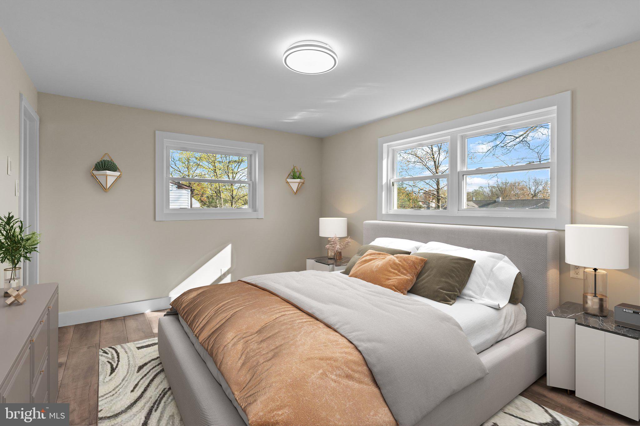 686 Spruce Road Warminster, PA 18974 - Photo 14 of 38 a bedroom with a bed and a painting on the wall