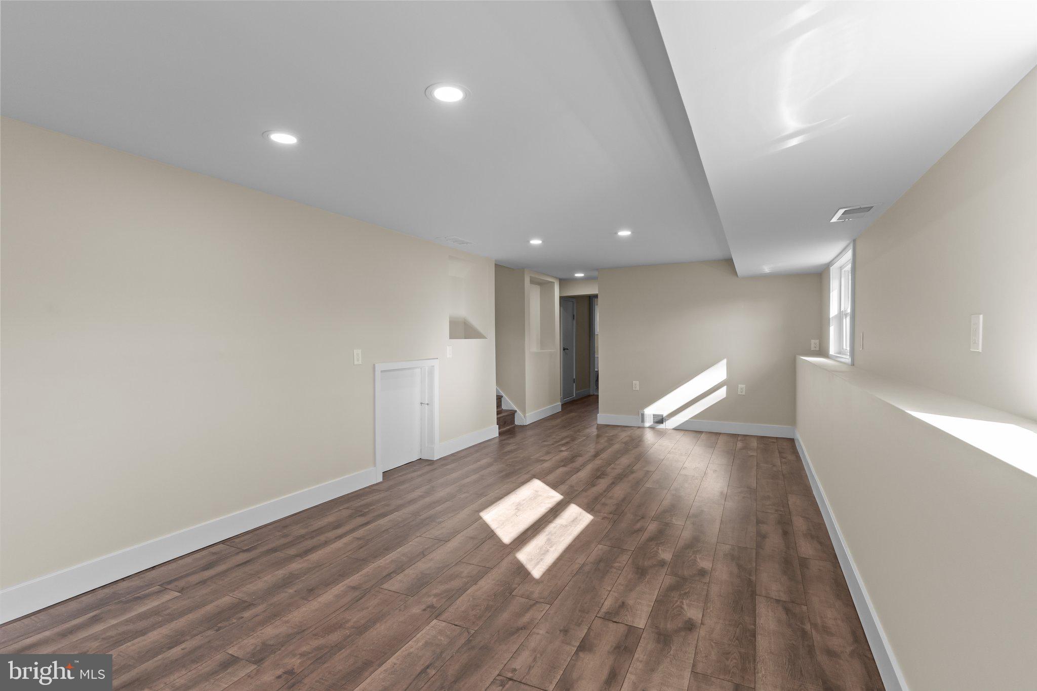 686 Spruce Road Warminster, PA 18974 - Photo 26 of 38 a view of empty room with wooden floor