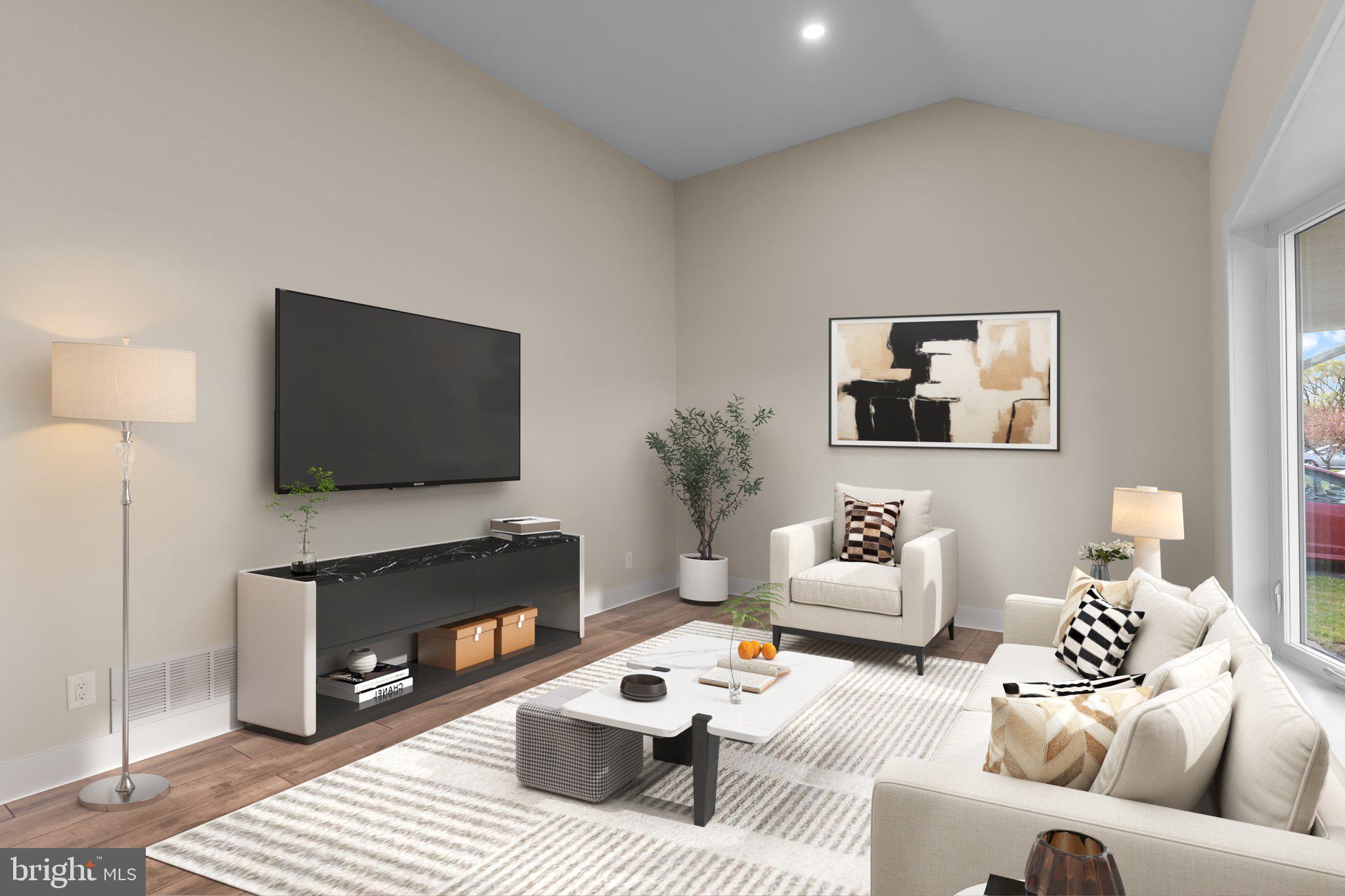 686 Spruce Road Warminster, PA 18974 - Photo 3 of 38 a living room with furniture a flat screen tv and a fireplace