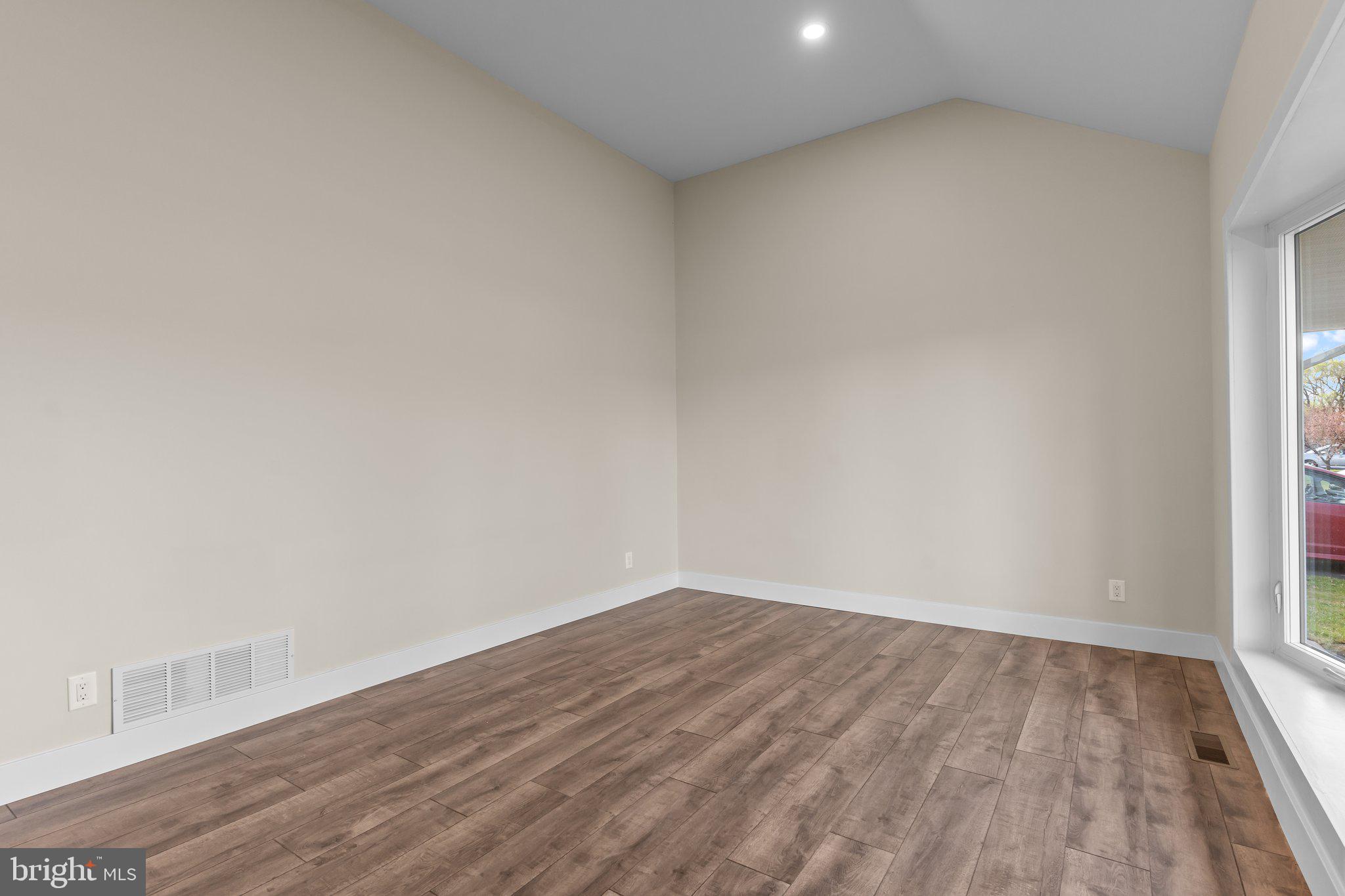 686 Spruce Road Warminster, PA 18974 - Photo 4 of 38 a view of room with wooden floor