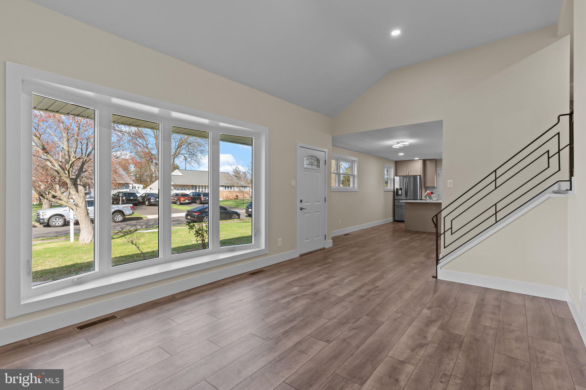 686 Spruce Road Warminster, PA 18974 - Photo 5 of 38 wooden floor in an empty room with a window