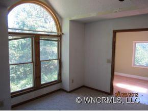 600 Oak Ridge Drive Clyde, NC 28721 - Photo 11 of 24 an empty room with windows