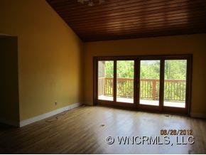 600 Oak Ridge Drive Clyde, NC 28721 - Photo 6 of 24 a view of an empty room with a window