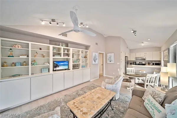 a living room with furniture and a table