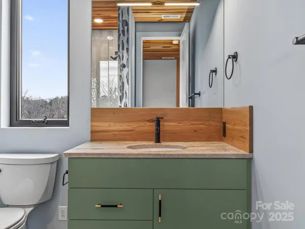 a bathroom with a sink and a toilet