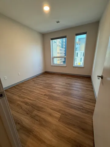 an empty room with windows