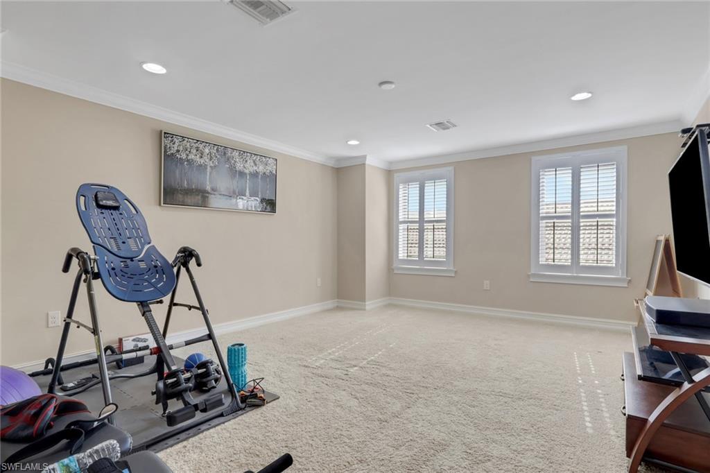 16309 Aberdeen Way Naples, FL 34110 - Photo 27 of 34 a room with furniture and a window