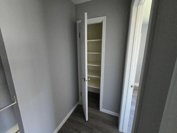 a view of an empty walk in closet