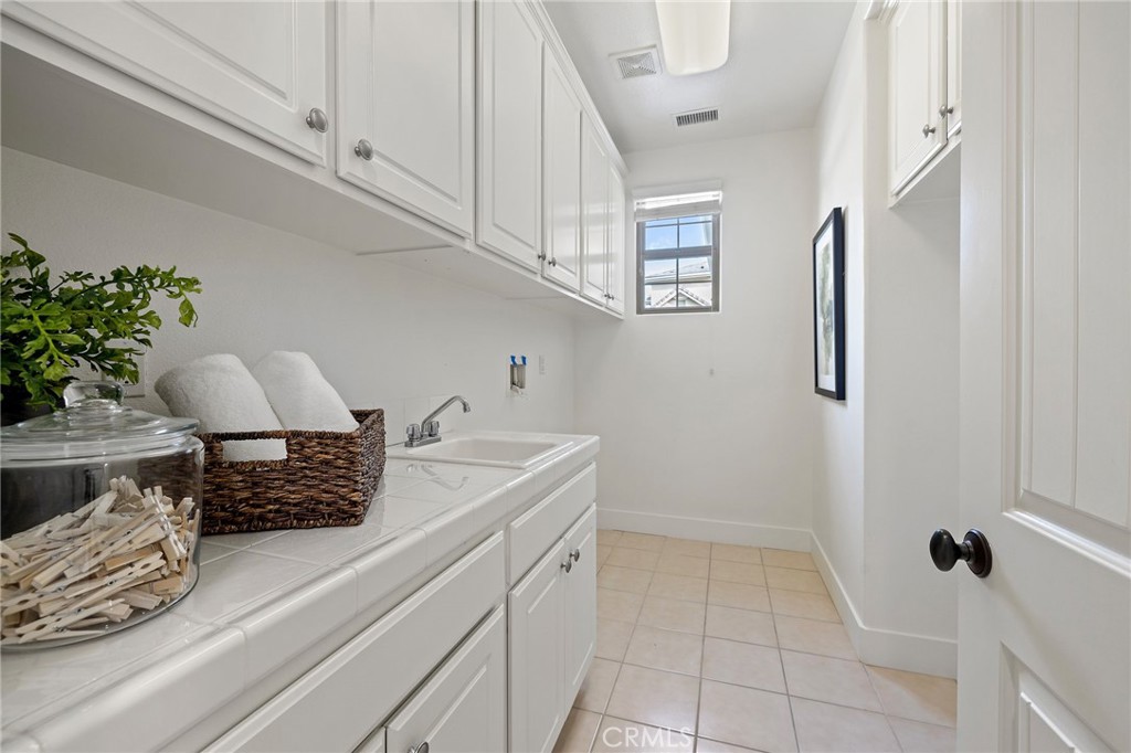 13347 Highstone Manor Court Rancho Cucamonga, CA 91739 - Photo 31 of 70 Laundry Room with Sink & Space for Refrigerator