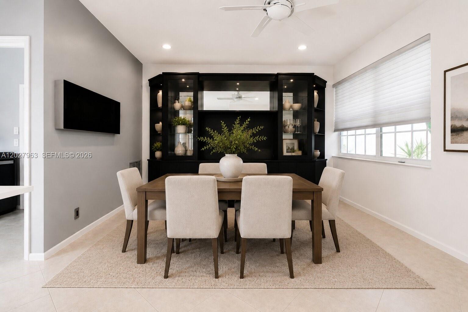 6646 Northwest 25th Terrace Boca Raton, FL 33496 - Photo 16 of 48 a view of a dining room with furniture