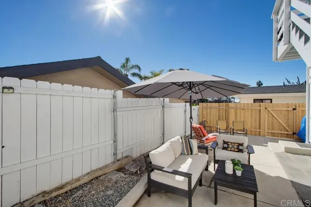 a view of chair and table in the room