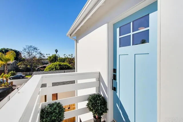 a view of building along with potted plants