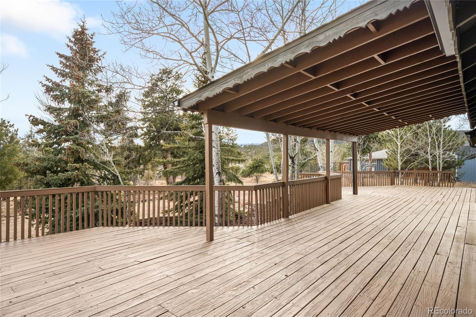 34657 Mohawk Trail Pine, CO 80470 - Photo 33 of 46 a view of a roof deck