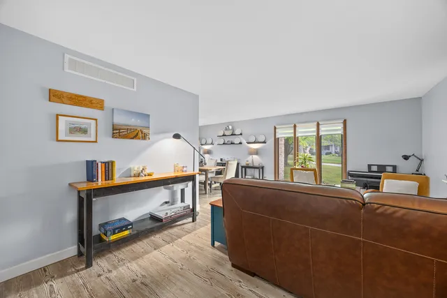 a room with furniture and a window