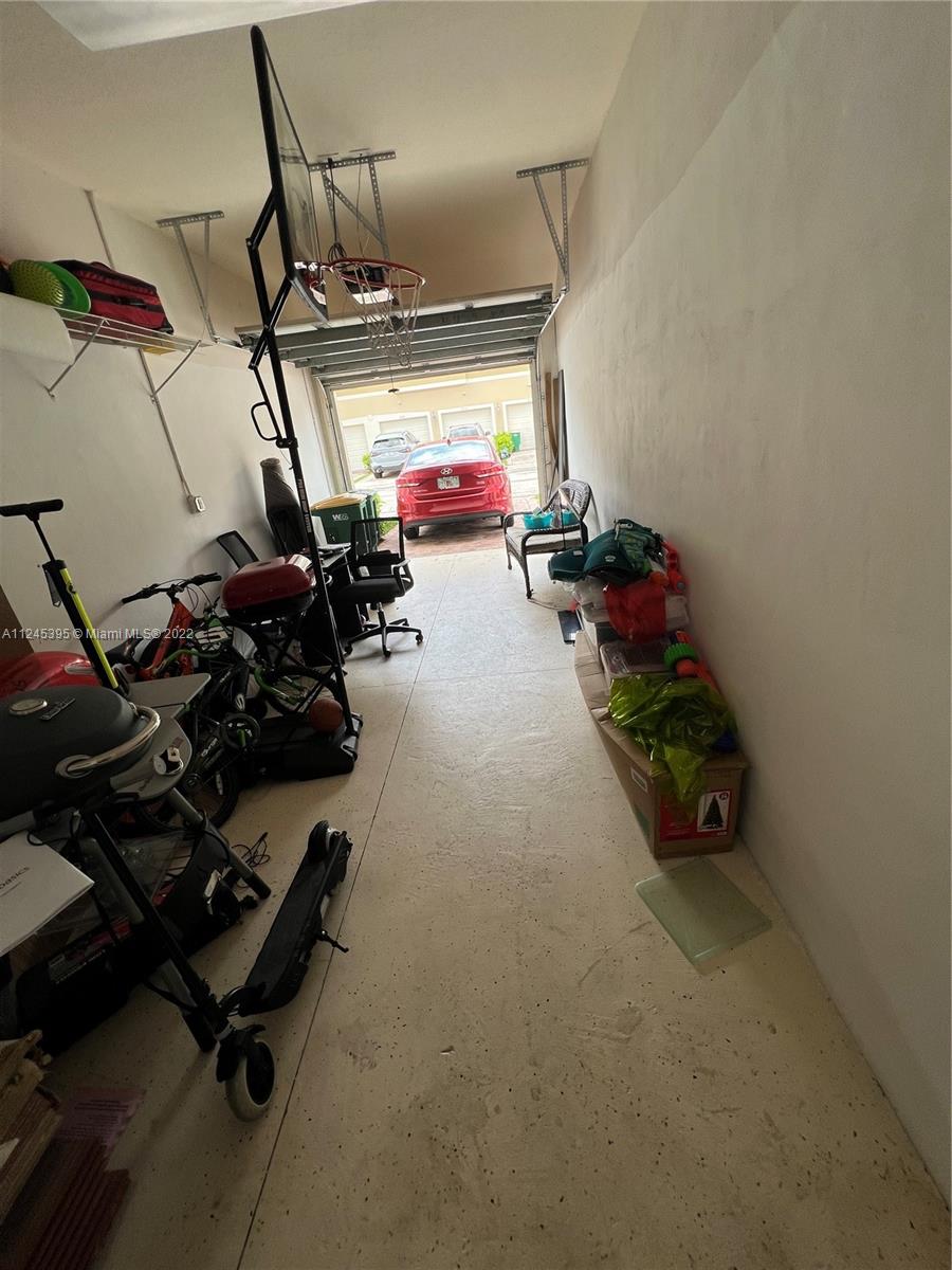 Hampton Hills Condominiums Tamarac, FL 33321 - Photo 15 of 24 a view of gym equipment in a room