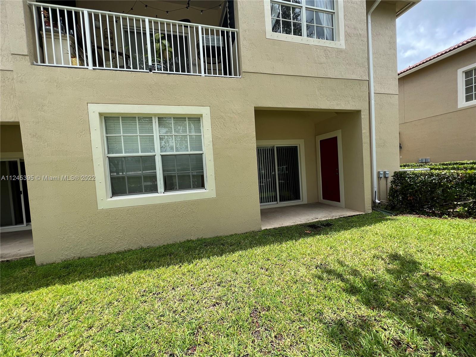 Hampton Hills Condominiums Tamarac, FL 33321 - Photo 19 of 24 a view of an entrance of the house