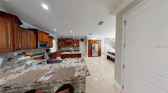 $600,000 | 12663 Flatwood Creek Drive, Gibsonton, FL 33534