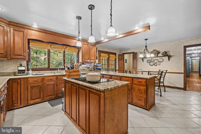 a bathroom with a toilet a sink and a mirror