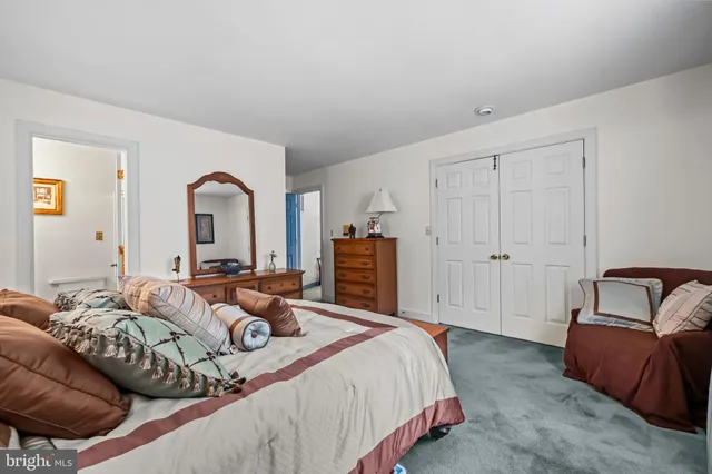 a view of a building with a couple of table and chairs