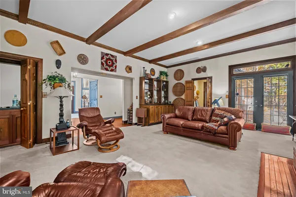 a room with furniture and gym equipment