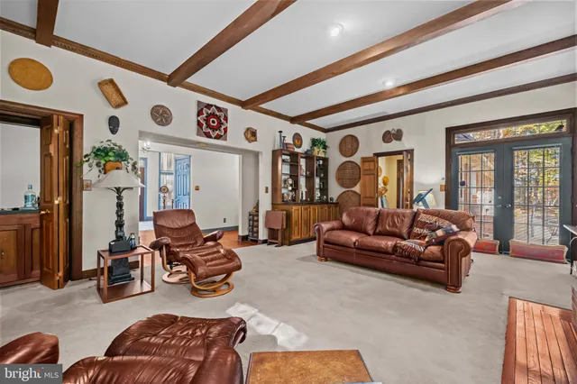 a room with furniture and gym equipment