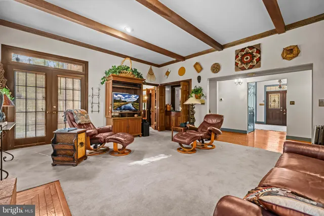 a bathroom with a sink a mirror and a toilet