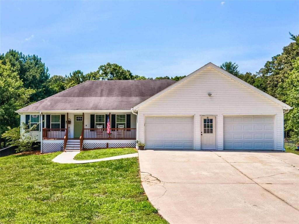2368 Ridge Road Douglasville, GA 30134 - Photo 1 of 1 a front view of a house with a yard