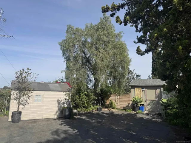 a view of a house with a street