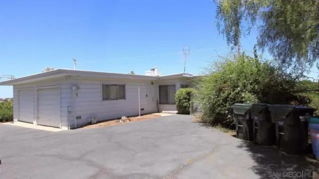 a view of a house with a garage