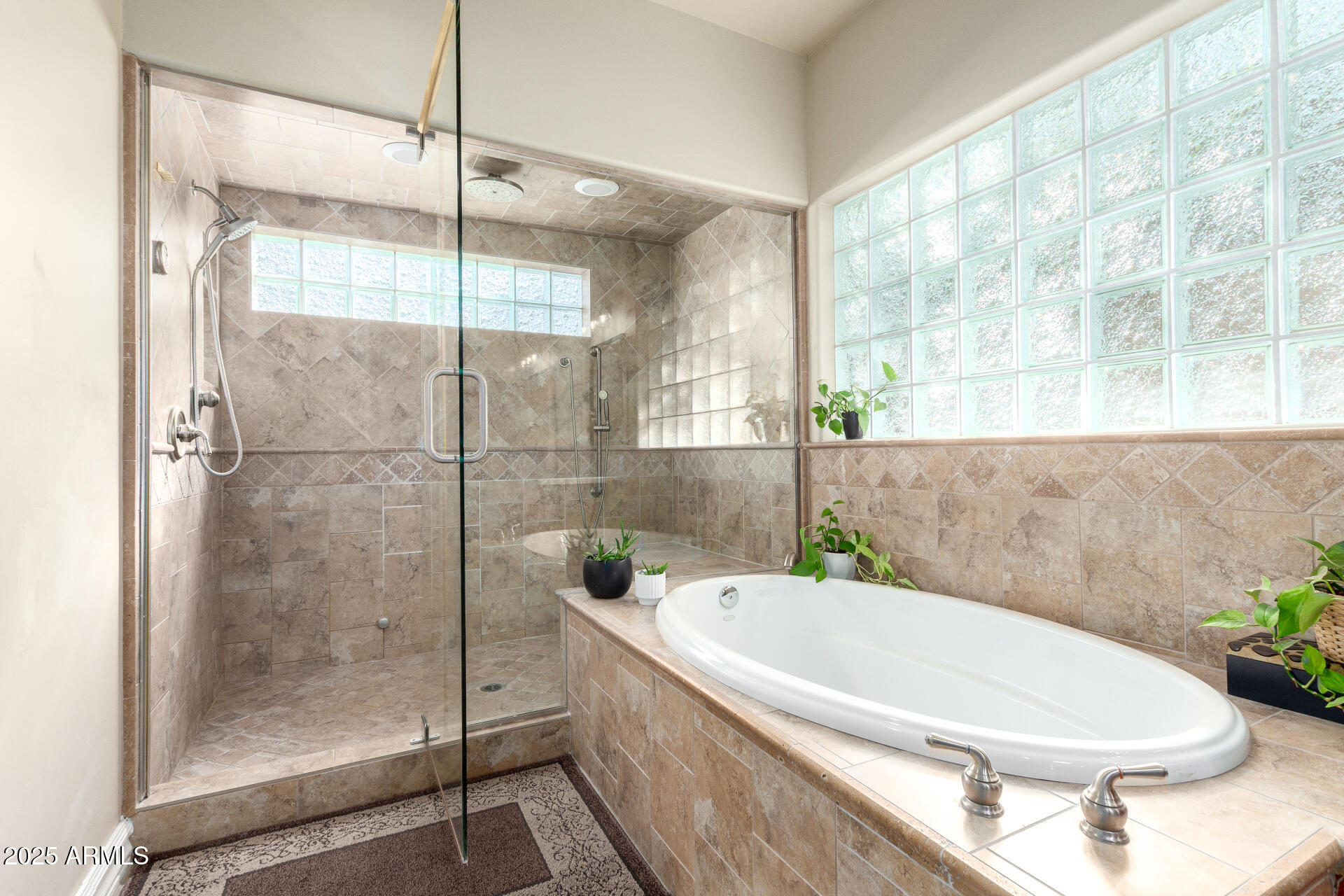 1135 East Lawrence Road Phoenix, AZ 85020 - Photo 17 of 23 a bathroom with a tub and shower
