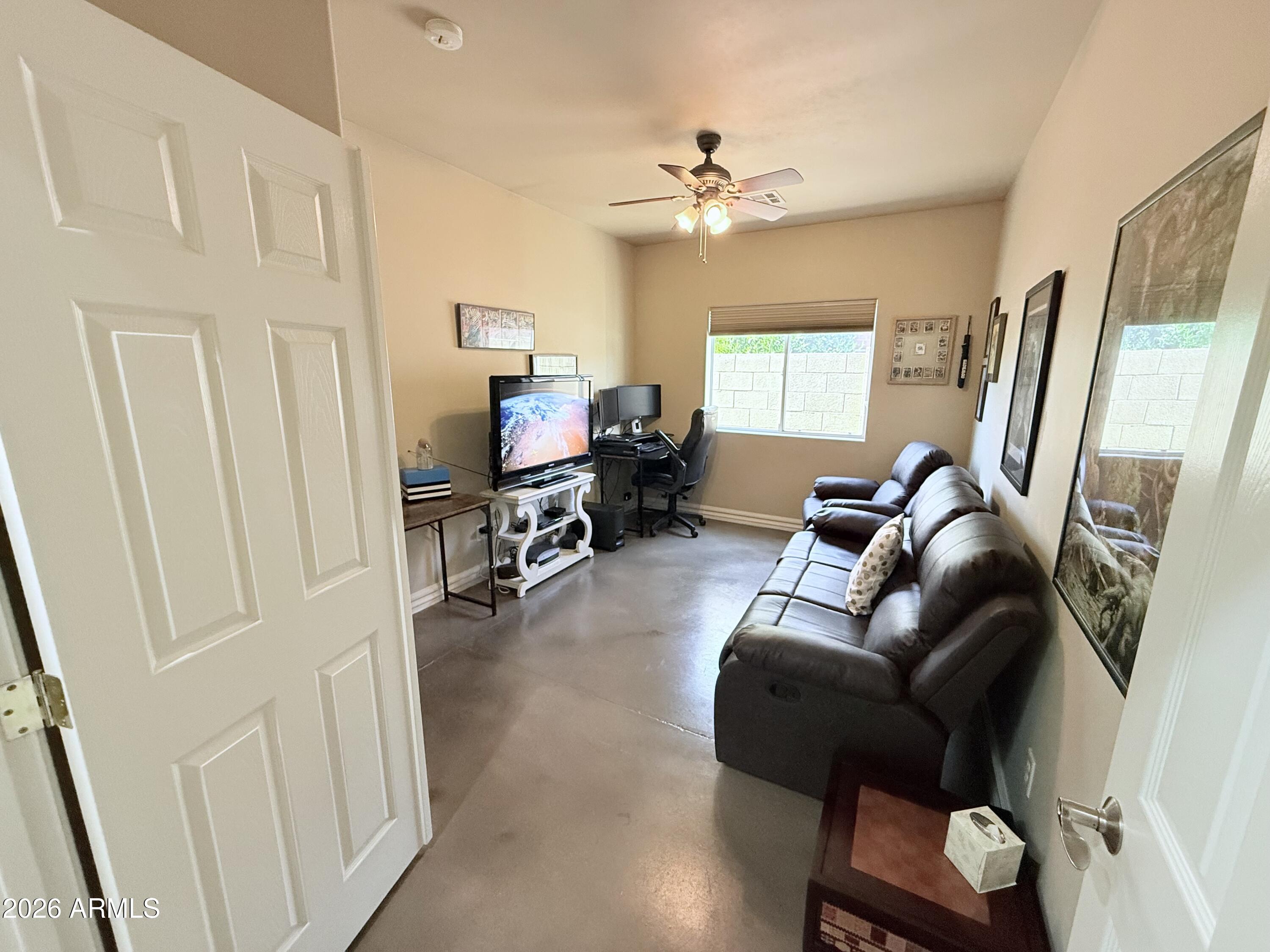 1135 East Lawrence Road Phoenix, AZ 85020 - Photo 18 of 23 a view of a livingroom with couch and wooden floor