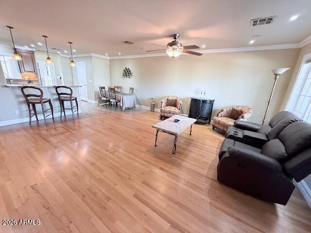 1135 East Lawrence Road Phoenix, AZ 85020 - Photo 4 of 23 a living room with furniture and kitchen view
