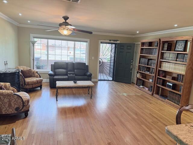 1135 East Lawrence Road Phoenix, AZ 85020 - Photo 5 of 23 a living room with furniture and a flat screen tv