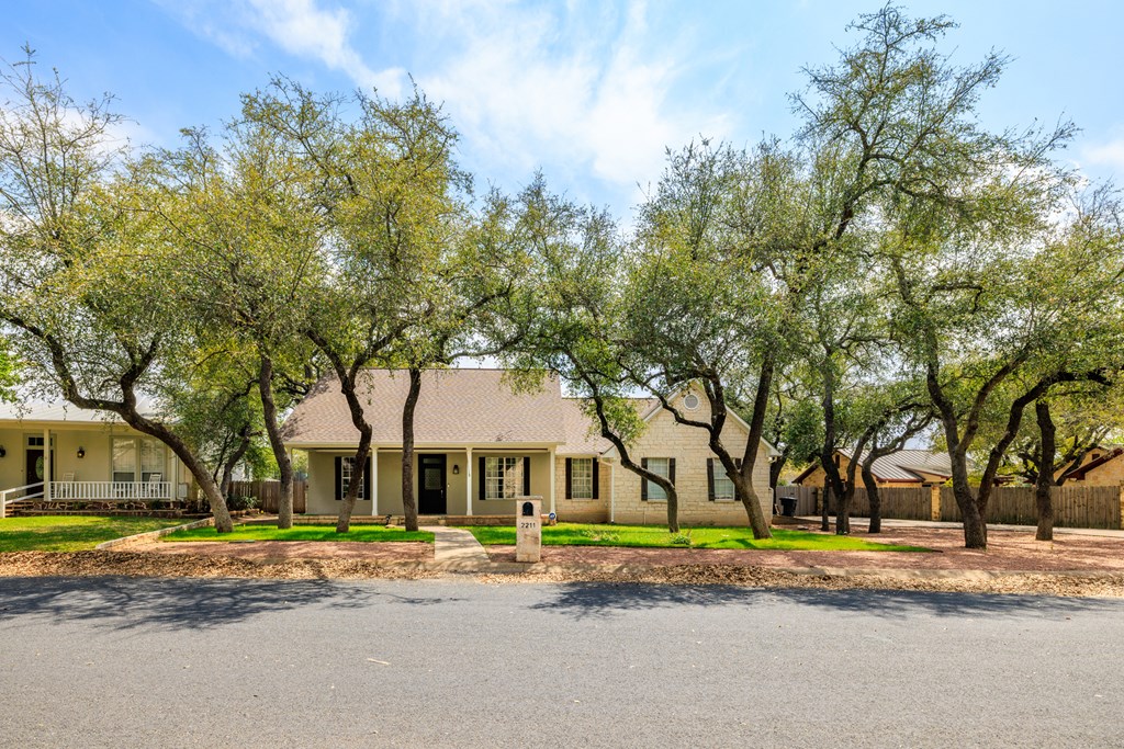 2211 Hedgestone Fredericksburg, TX 78624 - Photo 2 of 5 a view of street with large trees