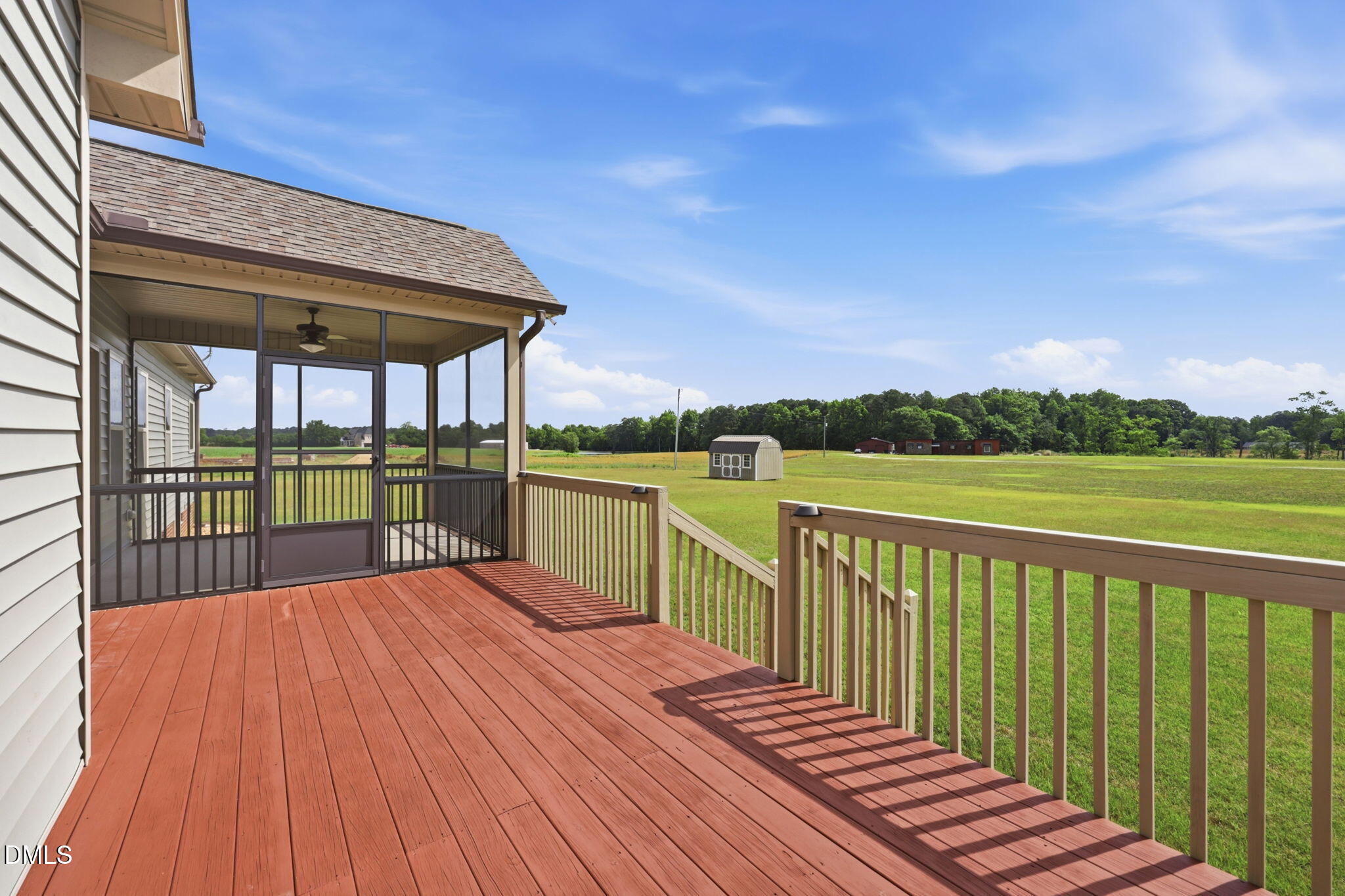 3587 Hannah Creek Road Benson, NC 27504 - Photo 30 of 43 a view of balcony with wooden floor and fence