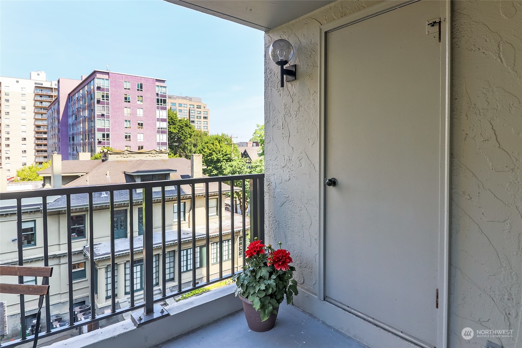 1120 Spring Street, Unit 401 Seattle, WA 98104 - Photo 11 of 34 a bathroom with a bathtub and a shower
