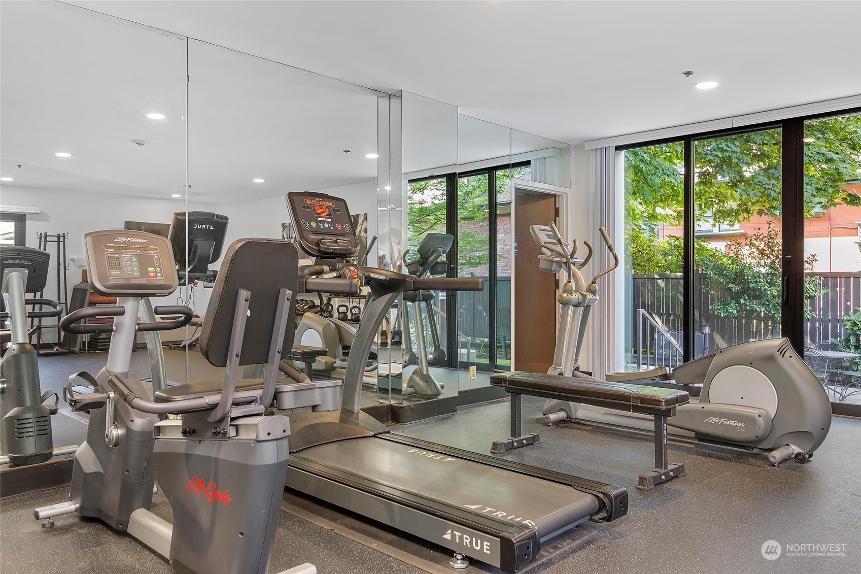 1120 Spring Street, Unit 401 Seattle, WA 98104 - Photo 28 of 34 a view of a room with gym equipment