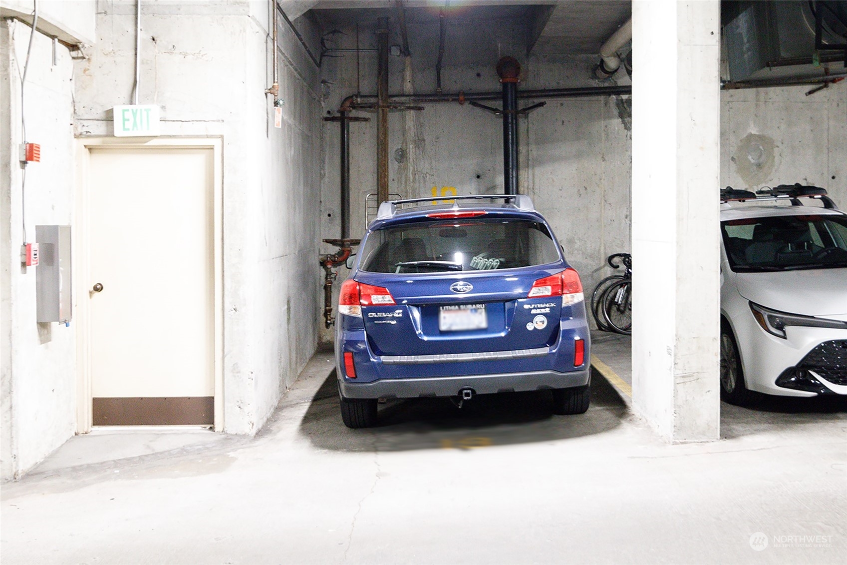 1120 Spring Street, Unit 401 Seattle, WA 98104 - Photo 33 of 34 a utility room with dryer and washer