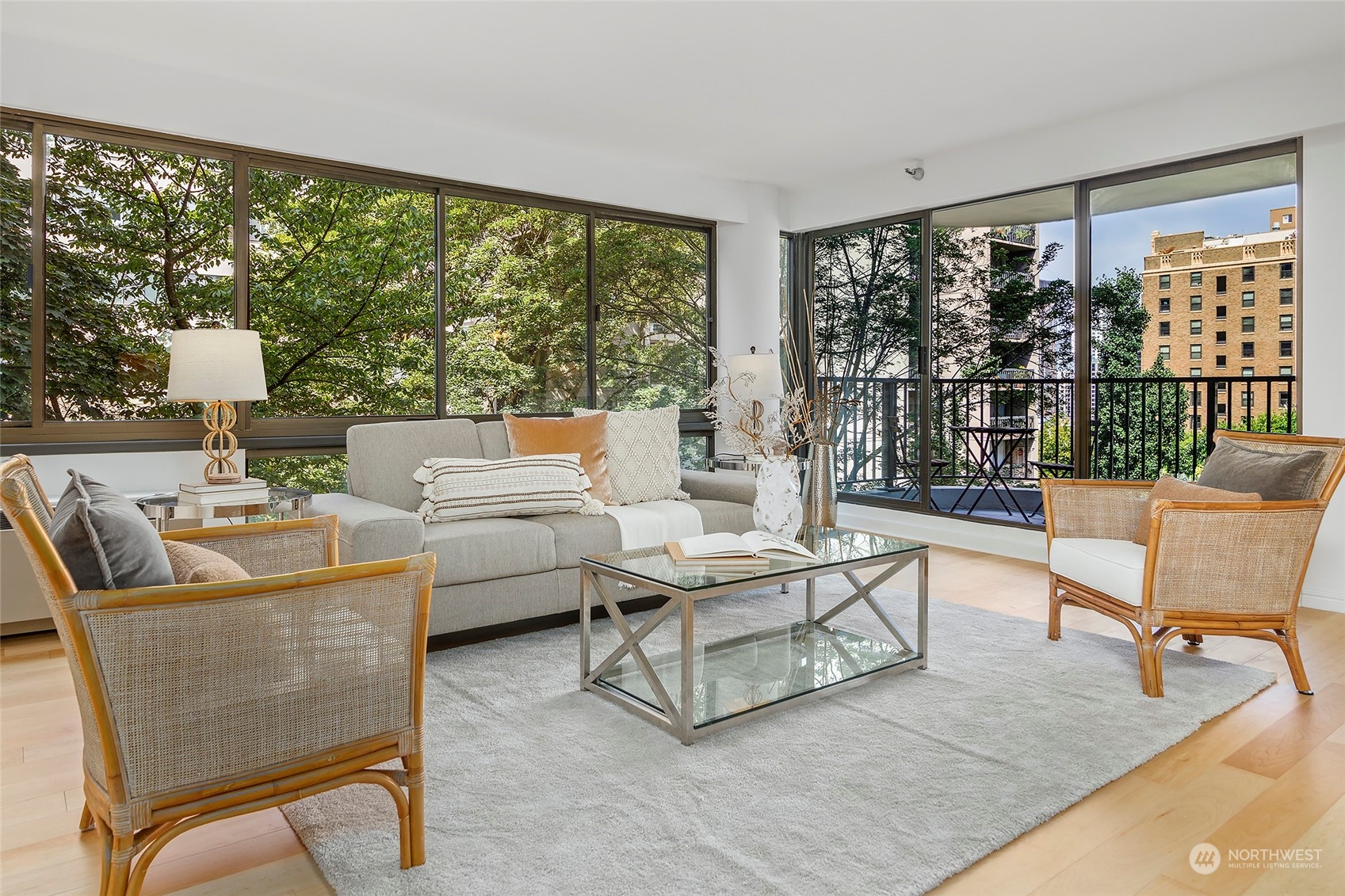 1120 Spring Street, Unit 401 Seattle, WA 98104 - Photo 8 of 34 a living room with furniture and a large window