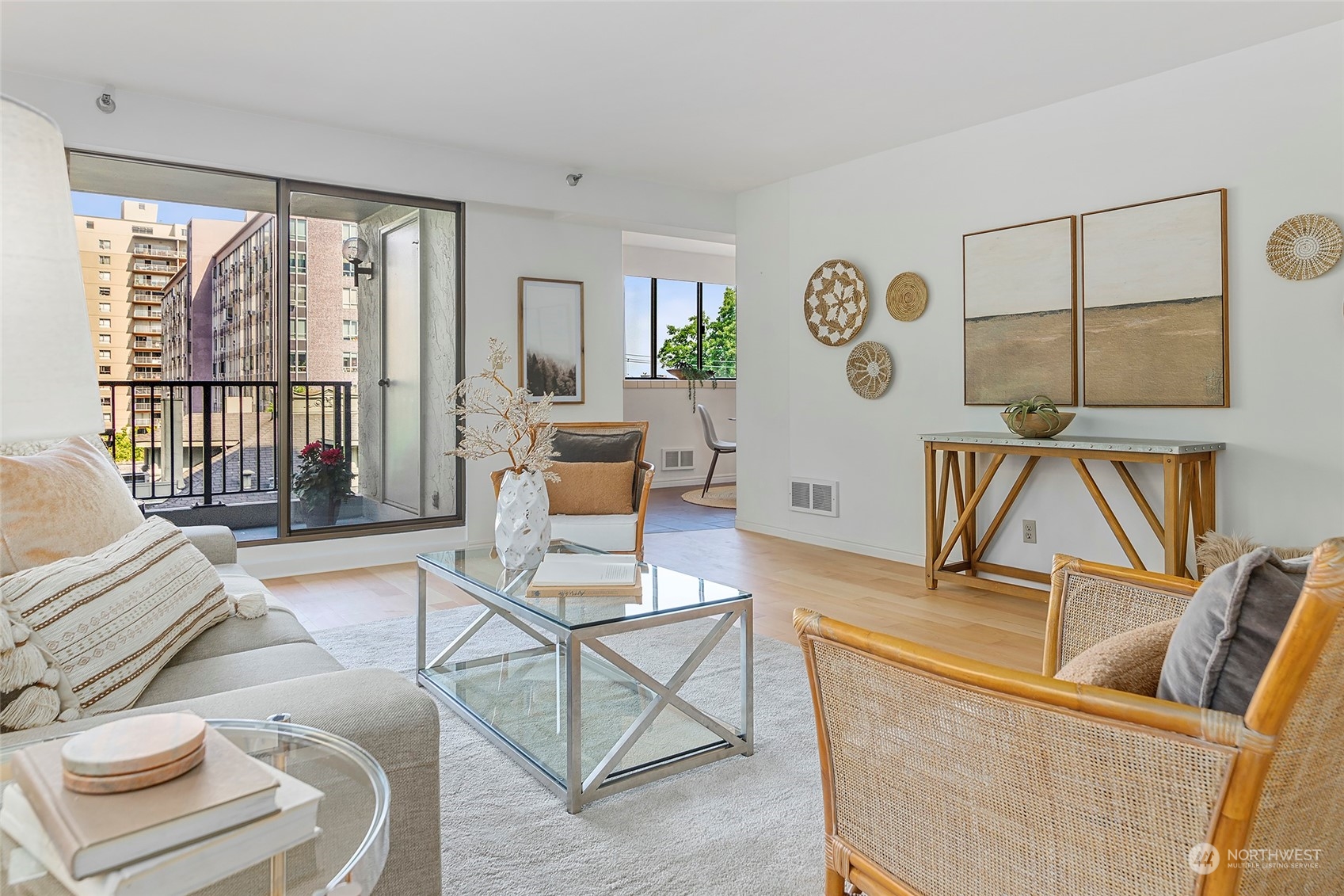 1120 Spring Street, Unit 401 Seattle, WA 98104 - Photo 9 of 34 a living room with furniture and a large window