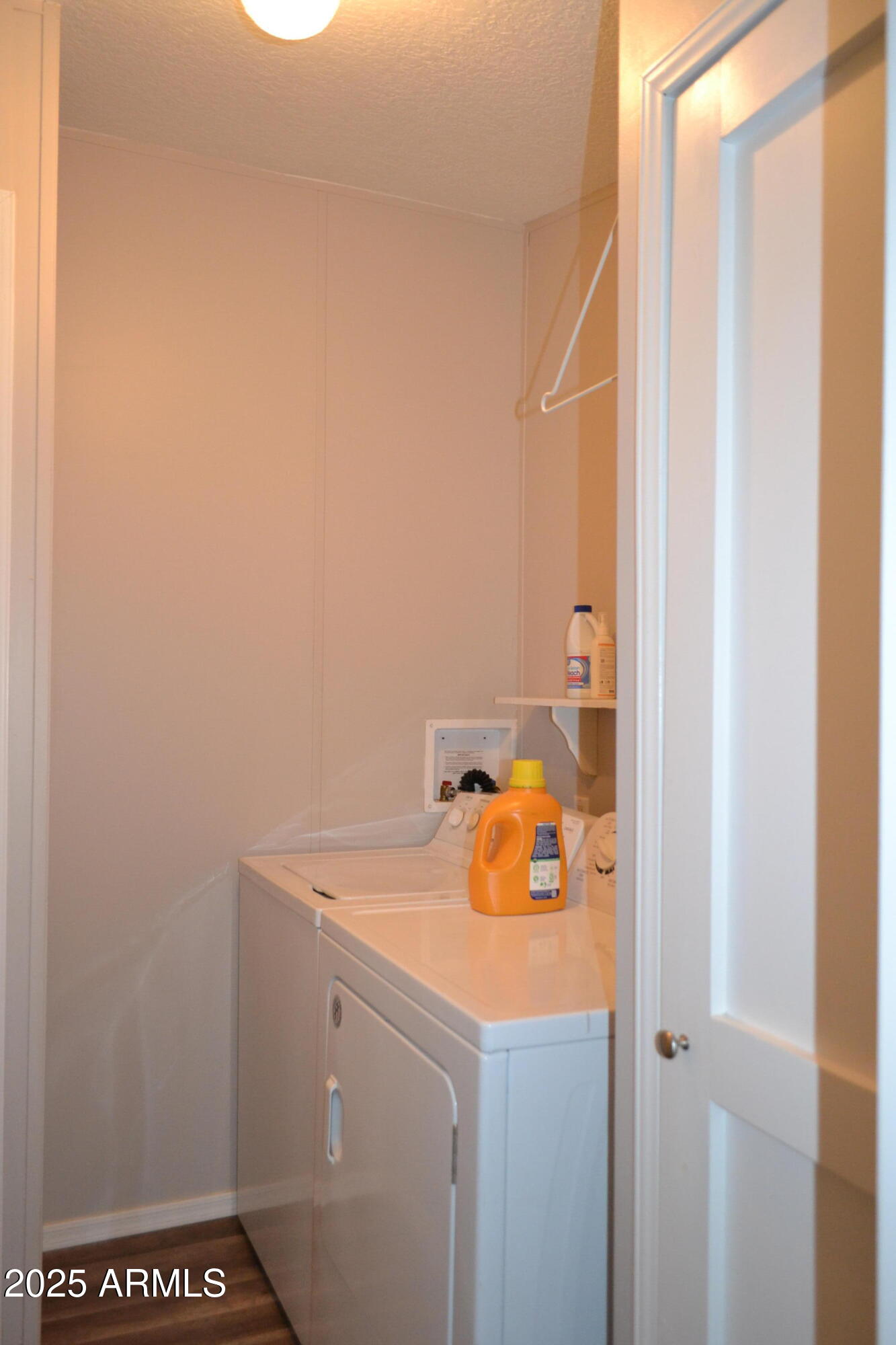 656 Sundown Drive Snowflake, AZ 85937 - Photo 11 of 29 a utility room with dryer and washer