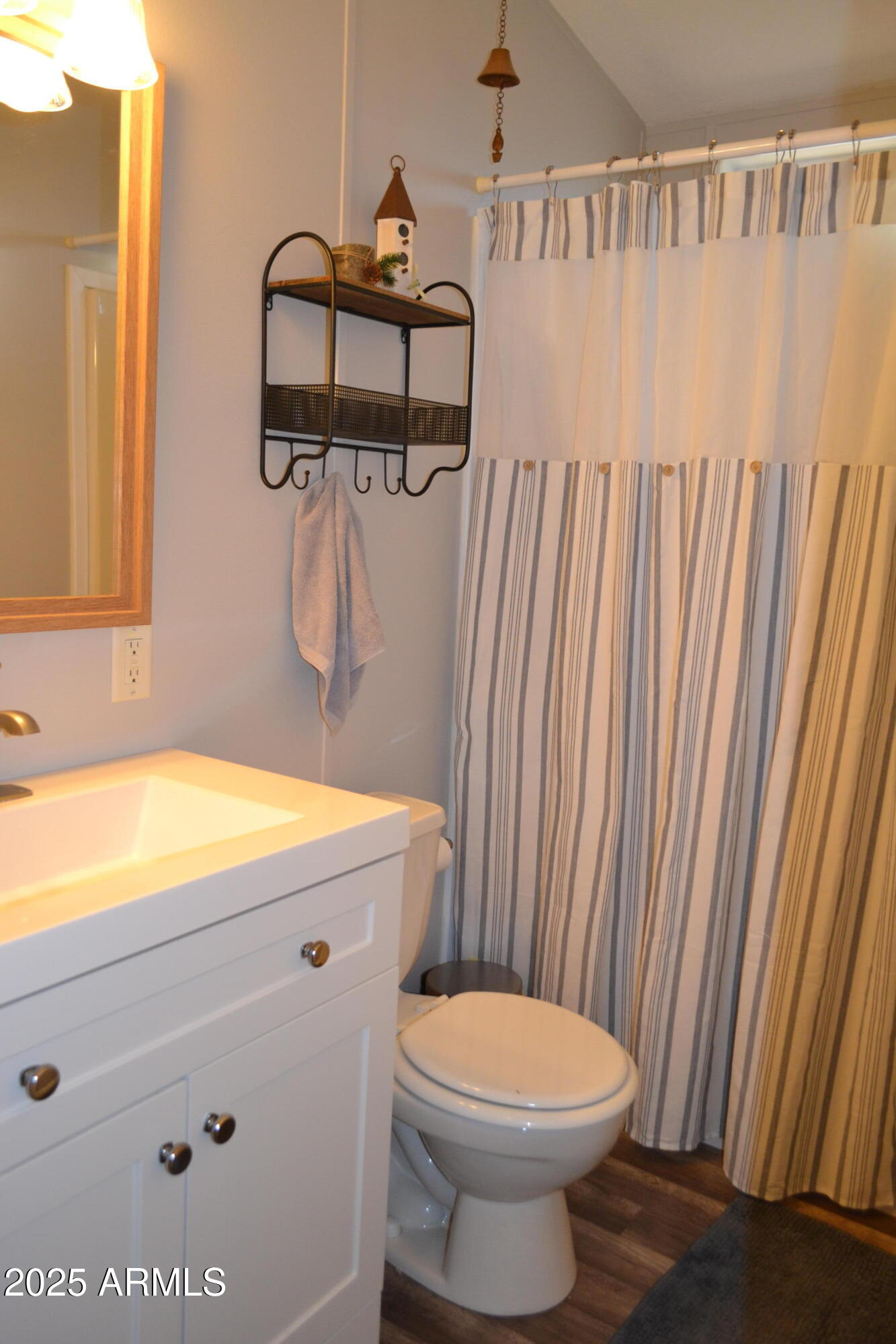 656 Sundown Drive Snowflake, AZ 85937 - Photo 16 of 29 a bathroom with a toilet and a sink