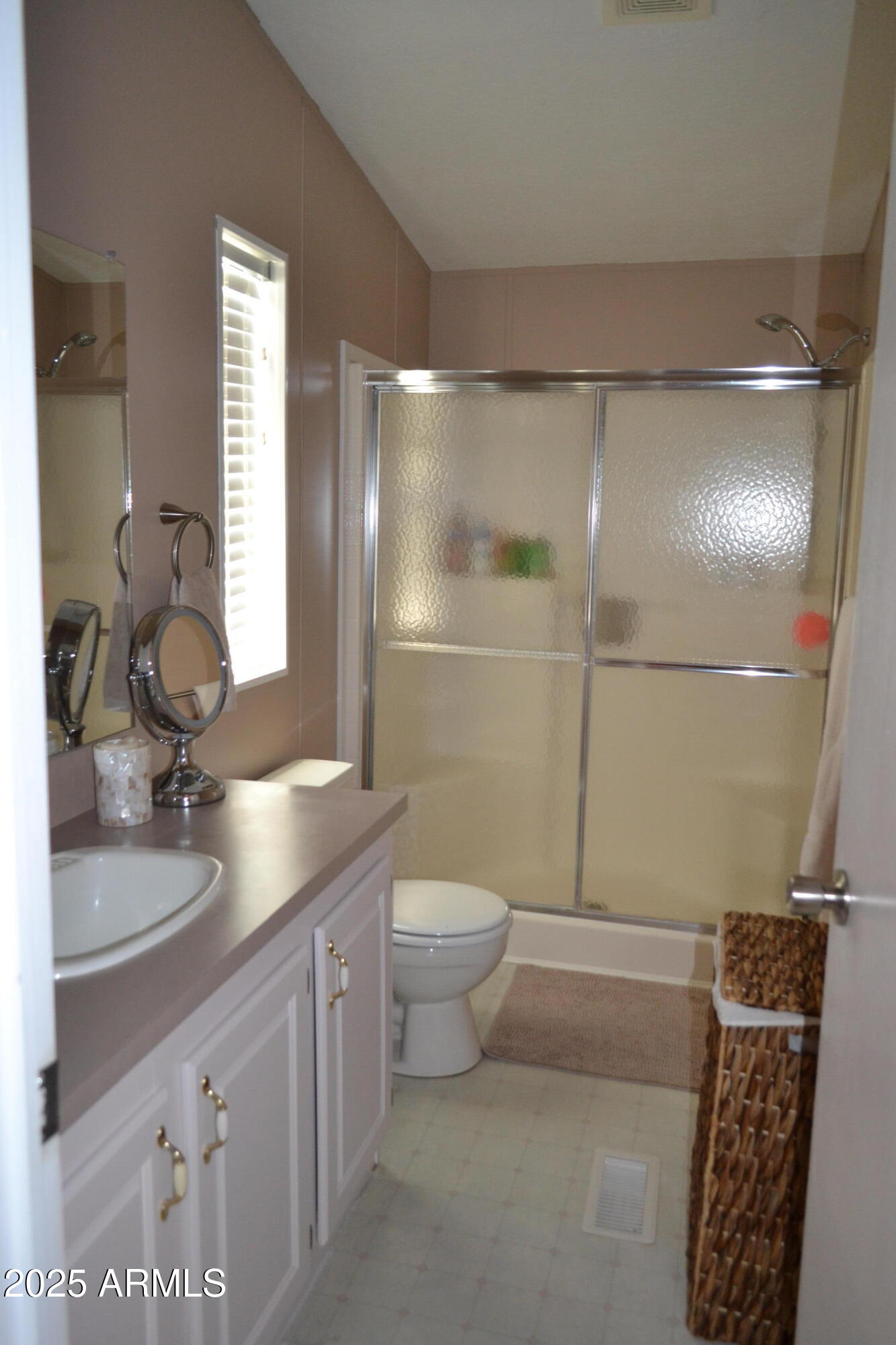 656 Sundown Drive Snowflake, AZ 85937 - Photo 19 of 29 a bathroom with a sink a toilet and shower
